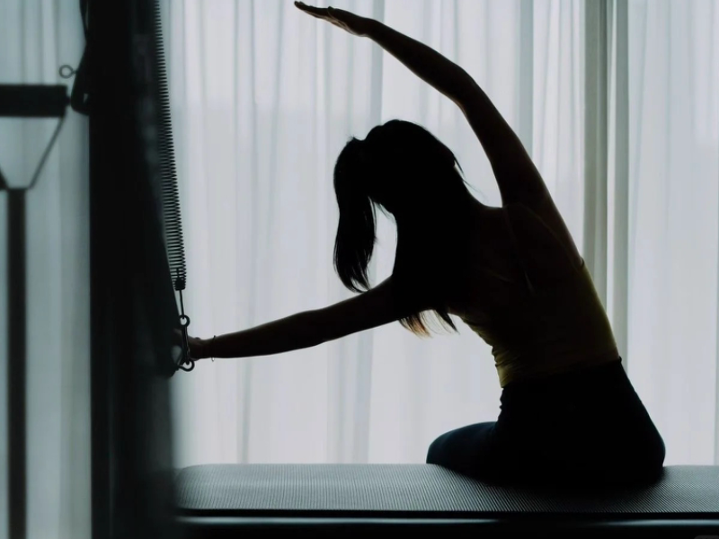  What Is a Pilates Reformer? Parts, Benefits & How It Works